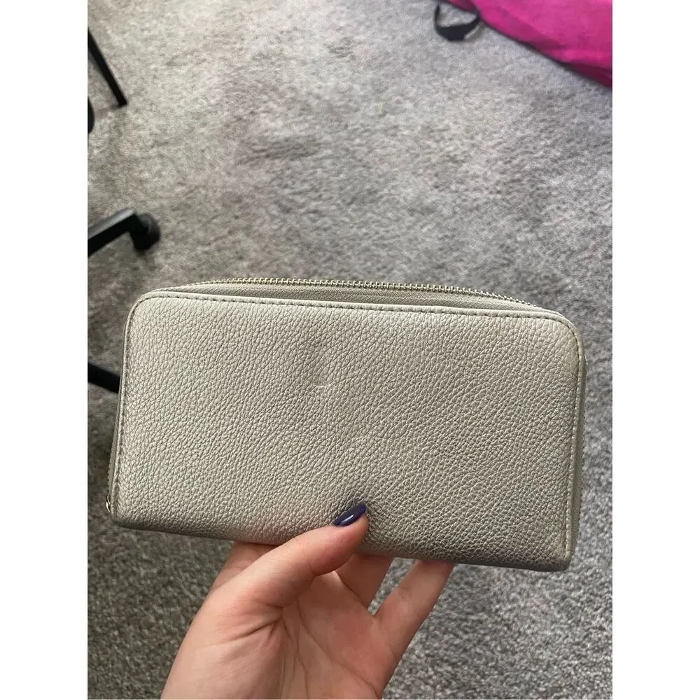 AA silver clutch with gold zipper